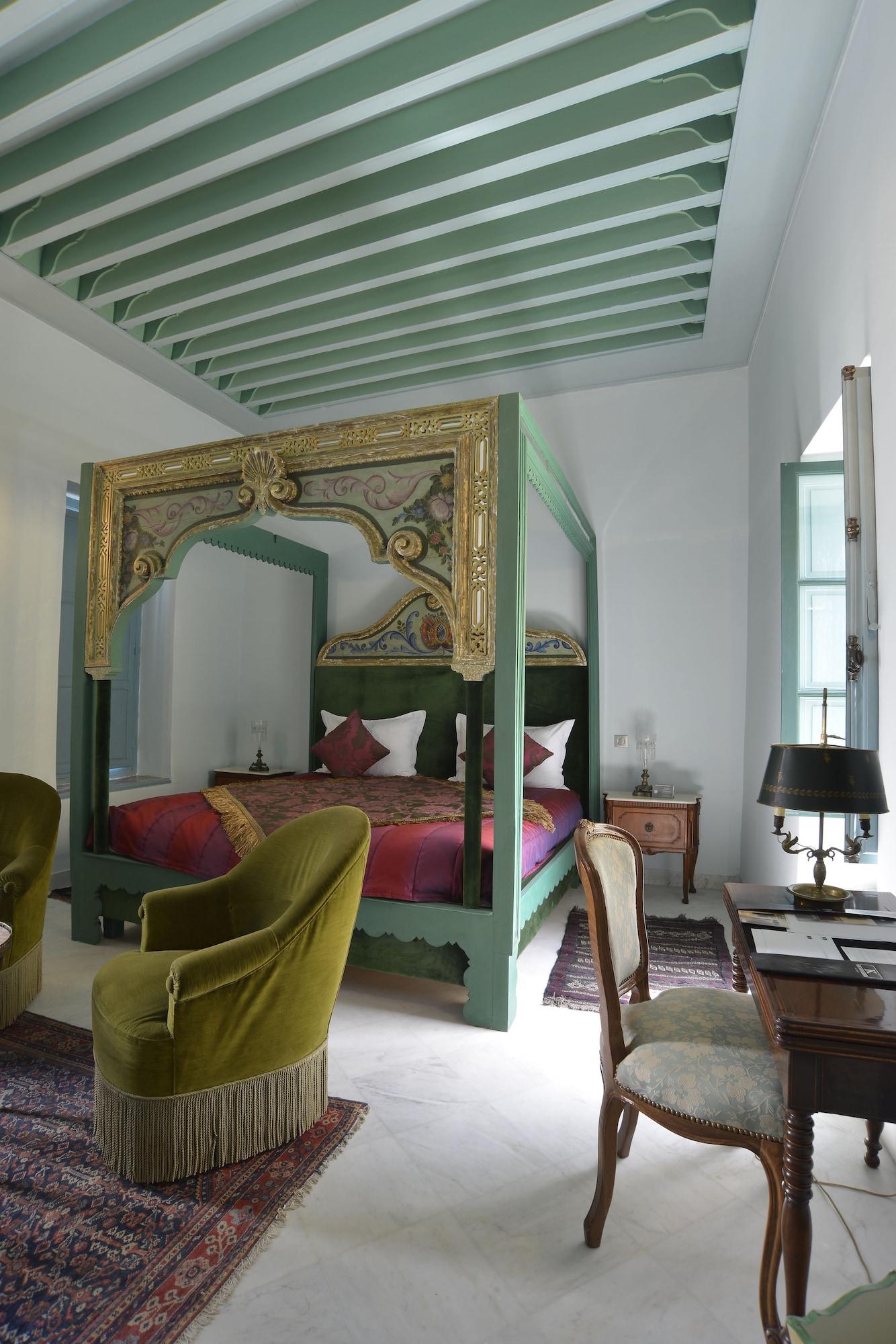 ホテル パレ バイラム チュニス エクステリア 写真 A bedroom in the Riad